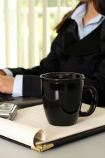 Businesswoman considering insurance